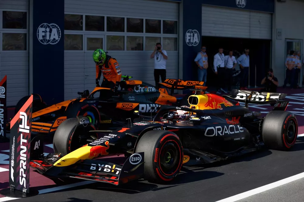 Pole man Max Verstappen, Red Bull Racing, and Lando Norris, McLaren F1 Team, arrive in Parc Ferme after Sprint Qualifying