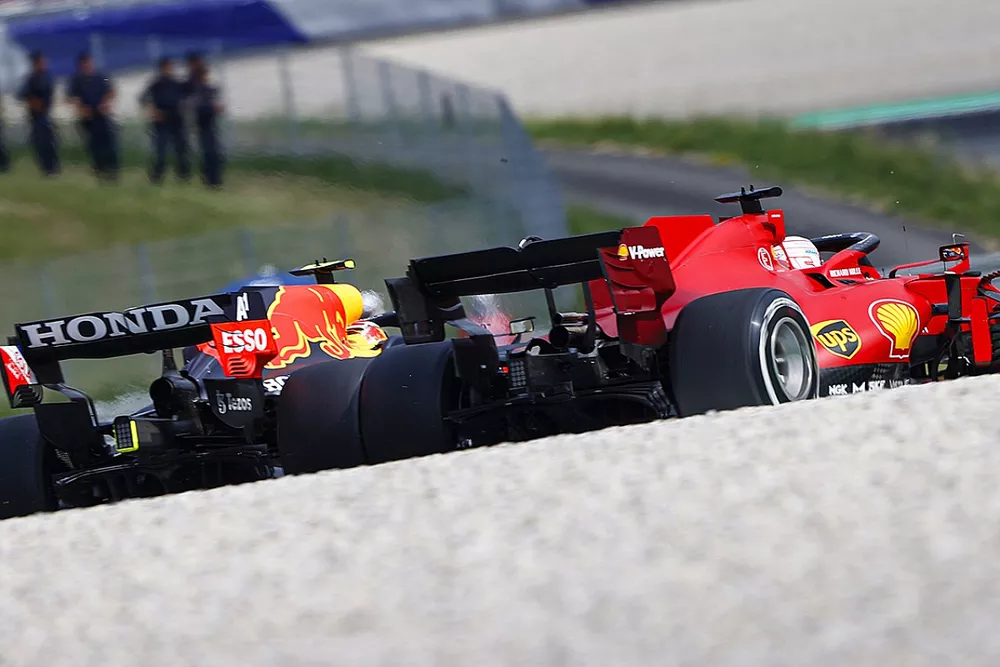 Sergio Perez, Red Bull Racing RB16B , battles with Charles Leclerc, Ferrari SF21