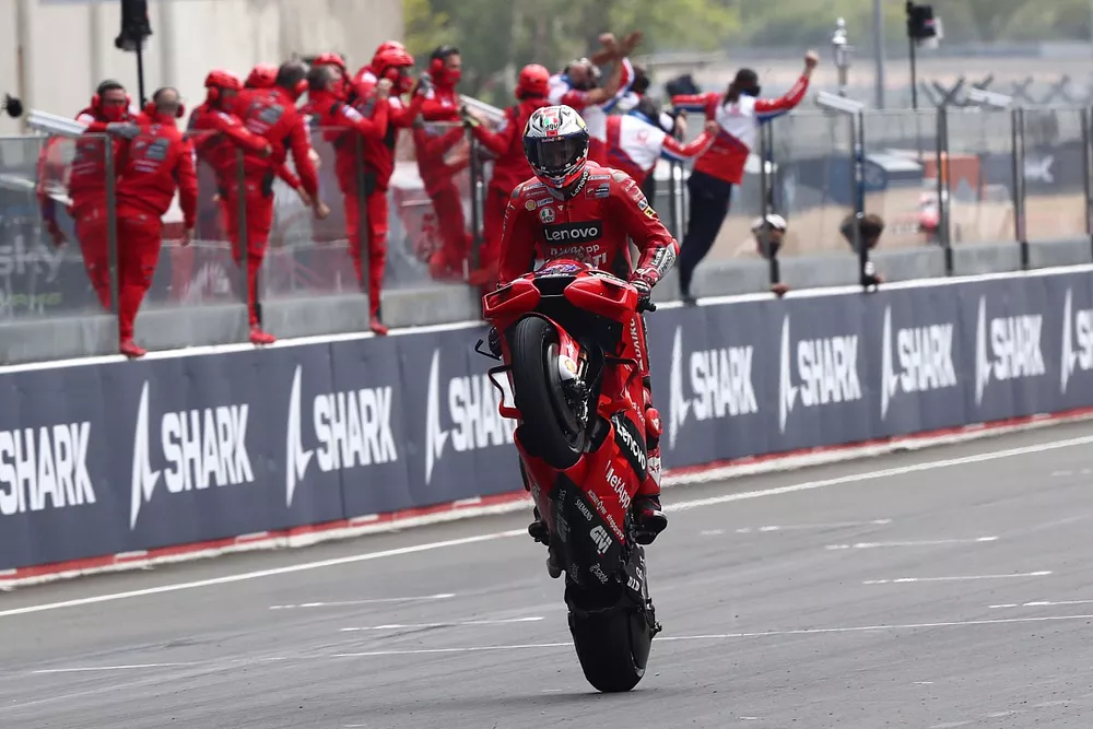 Race winner Jack Miller, Ducati Team, chequered flag