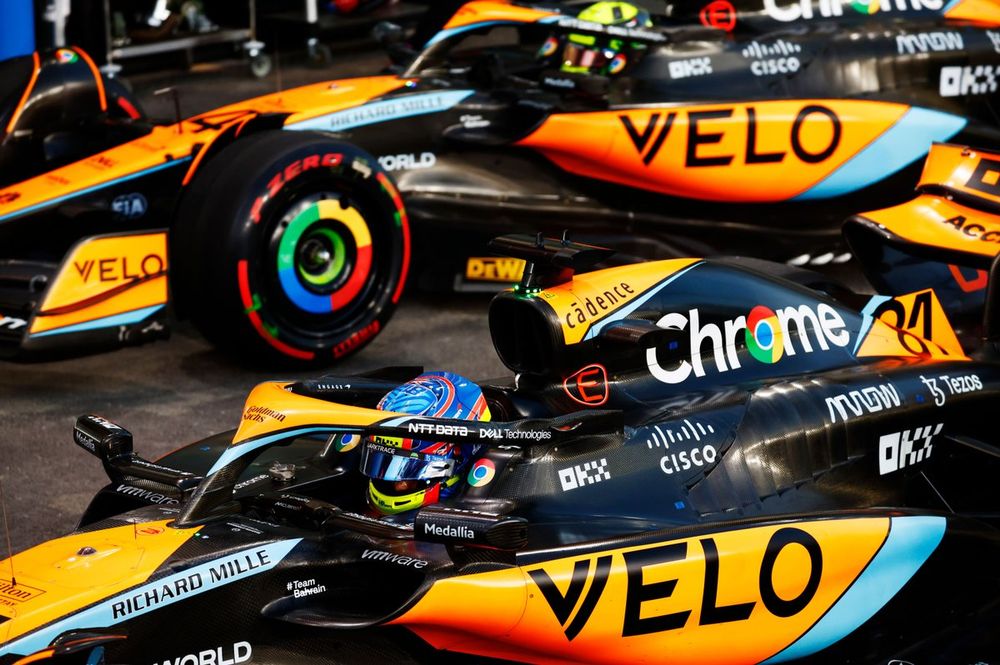 Sprint pole winner Oscar Piastri, McLaren MCL60, and Lando Norris, McLaren MCL60, arrive in Parc Ferme after the Sprint Shootout