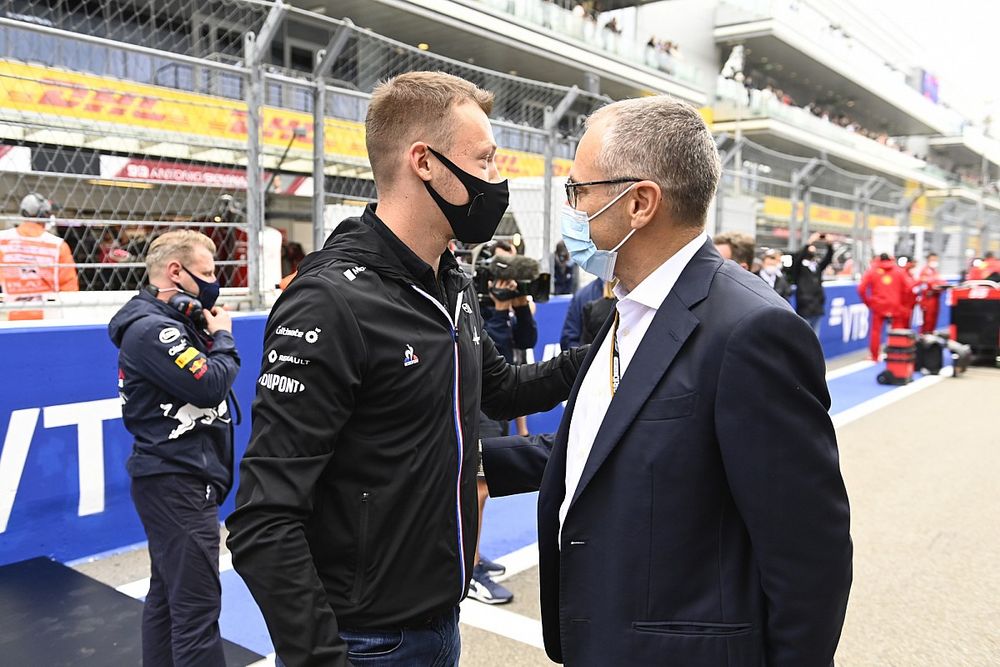 Daniil Kvyat, reserve driver, Alpine F1, with Stefano Domenicali, CEO, Formula 1, on the grid