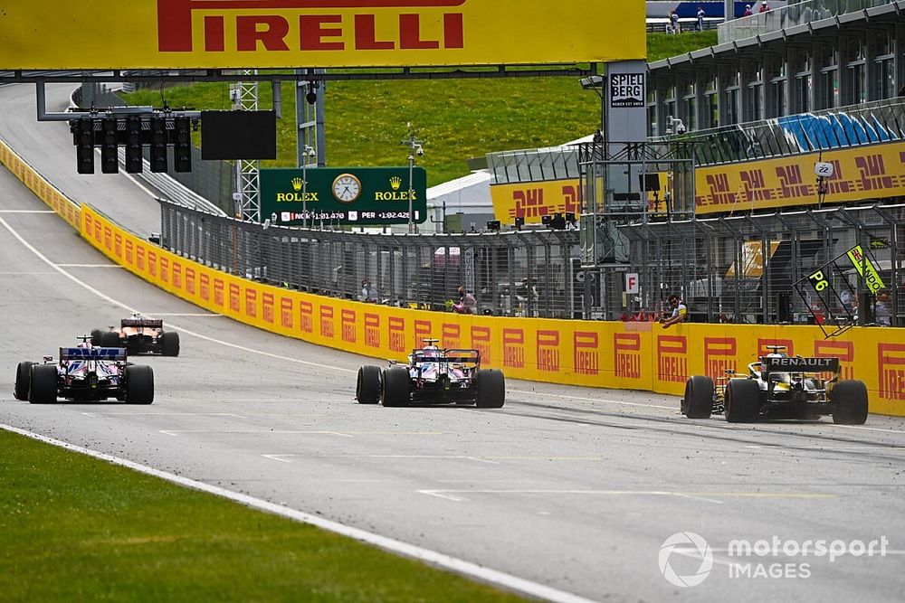 Lando Norris, McLaren MCL35, leads Sergio Perez, Racing Point RP20, Lance Stroll, Racing Point RP20 and Daniel Ricciardo, Renault F1 Team R.S.20 at the finish