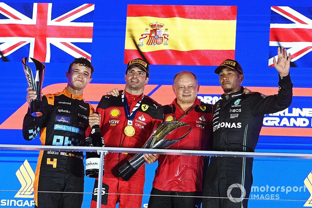 Lando Norris, McLaren, 2nd position, Carlos Sainz, Scuderia Ferrari, 1st position, Frederic Vasseur, Team Principal and General Manager, Scuderia Ferrari, Lewis Hamilton, Mercedes-AMG, 3rd position, on the podium