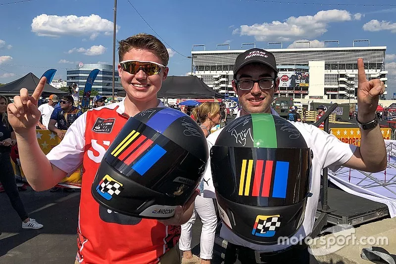 Wood Brothers Gaming Playstation 4 driver Slade Gravitt (sladeg84) and Team Penske eSports driver Brian Tedeschi (ShellVPower22) pose together after winning their respective races in the kickoff of the 2019 eNASCAR Heat Pro League season