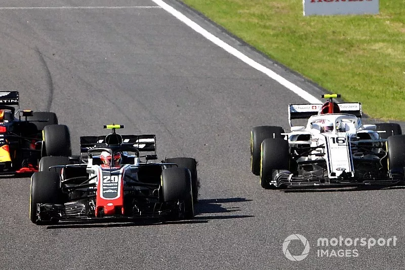 Kevin Magnussen, Haas F1 Team VF-18, Charles Leclerc, Sauber C37 et Daniel Ricciardo, Red Bull Racing RB14