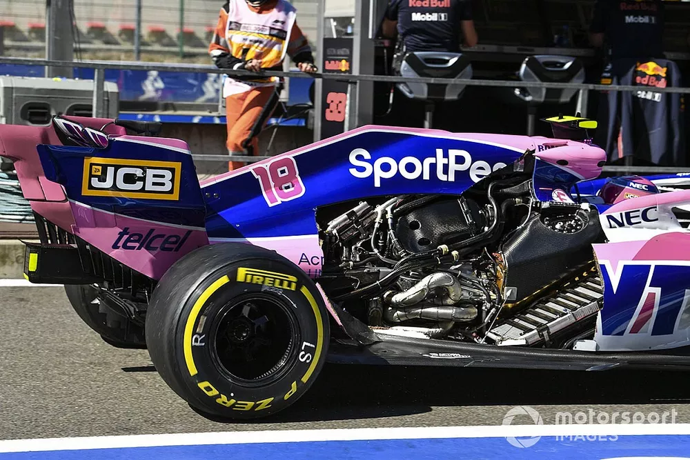 Lance Stroll, Racing Point RP19, returns to the pits without an engine cover in FP1