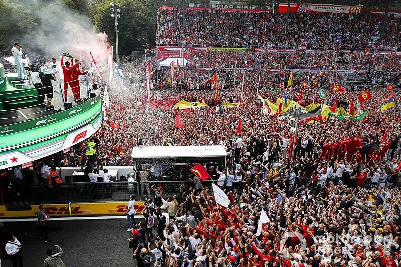 Race winner Charles Leclerc, Ferrari celebrates on the podium with the champagne