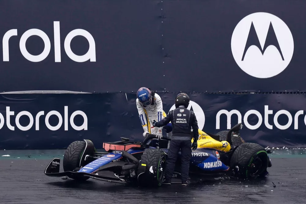 Alex Albon, Williams FW46, gets out of the car after crashing out of Qualifying 