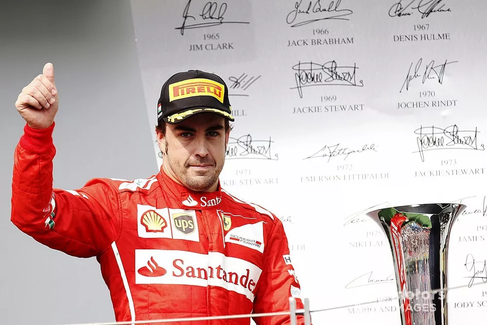 Podio: Fernando Alonso, Ferrari