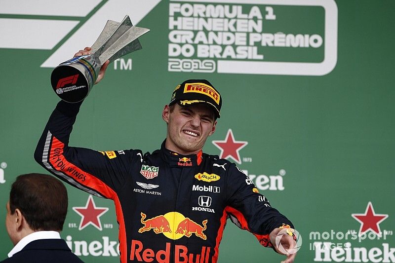 Max Verstappen, Red Bull Racing, 1st position, celebrates on the podium with his trophy