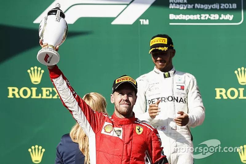 Podio: segundo lugar Sebastian Vettel, Ferrari
