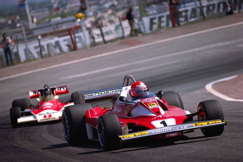 Niki Lauda, Ferrari 312T2, leads James Hunt, McLaren M23 Ford