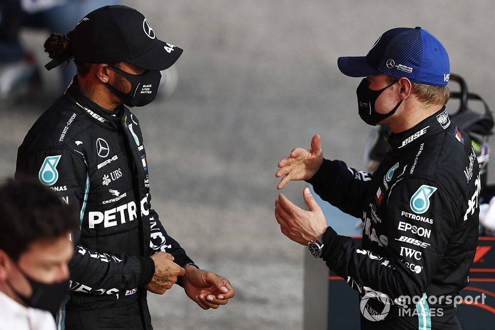 Lewis Hamilton, Mercedes-AMG F1, 1st position, and Valtteri Bottas, Mercedes-AMG F1, 2nd position, talk in Parc Ferme