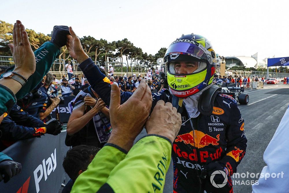 Sergio Perez, Red Bull Racing, 1st position, celebrates on arrival in Parc Ferme