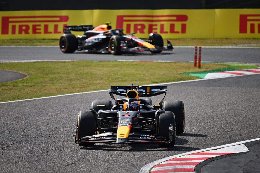 Max Verstappen, Red Bull Racing RB20, leads Sergio Perez, Red Bull Racing RB20