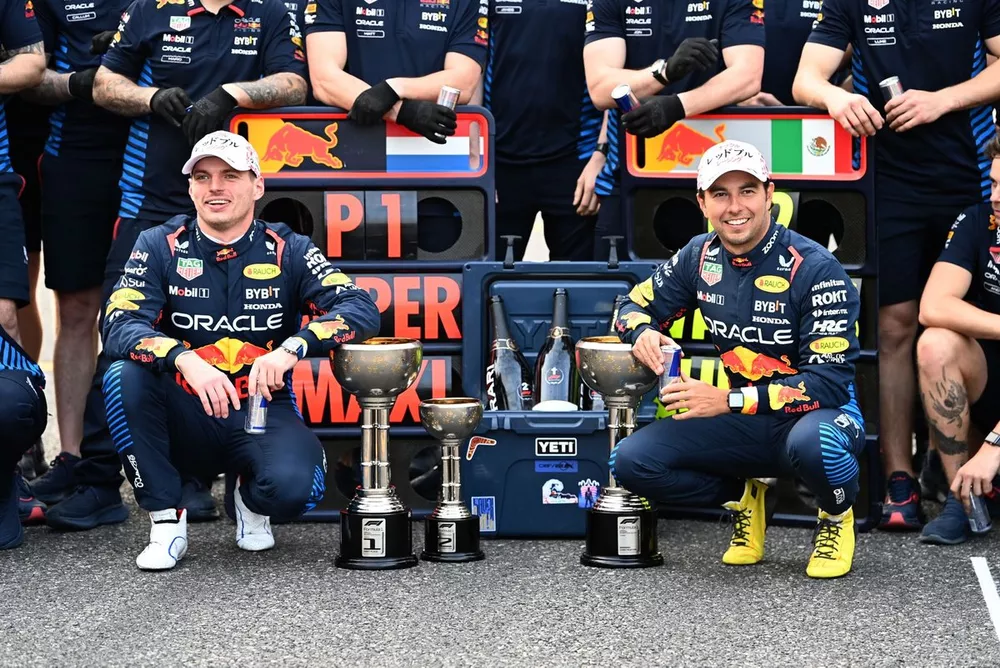 Max Verstappen, Red Bull Racing, 1st position, and Sergio Perez, Red Bull Racing, 2nd position, celebrate with their team