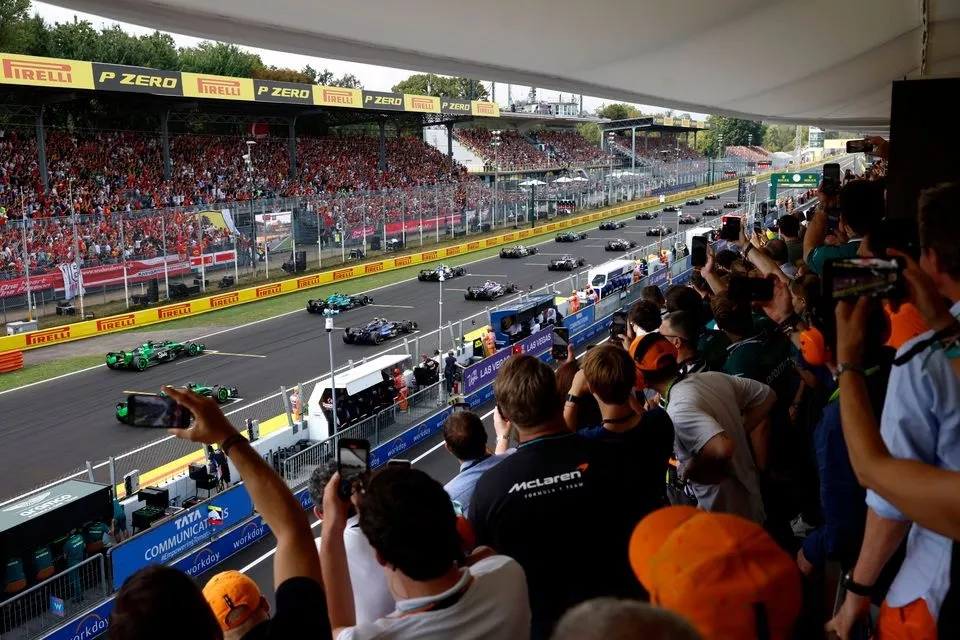 Fans watch the race start