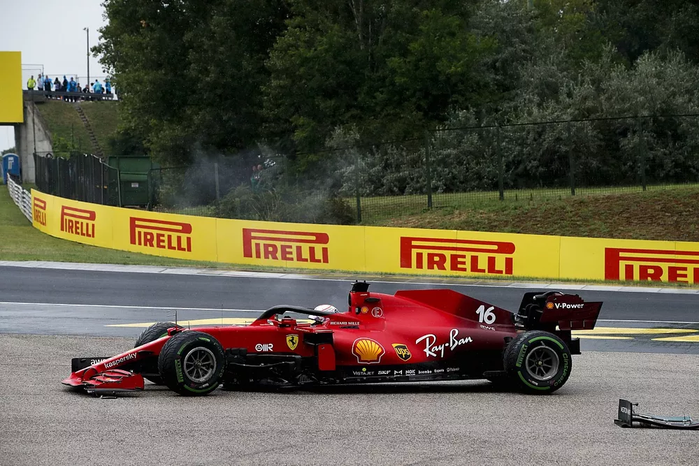 Charles Leclerc, Ferrari SF21, comes to a halt with damage