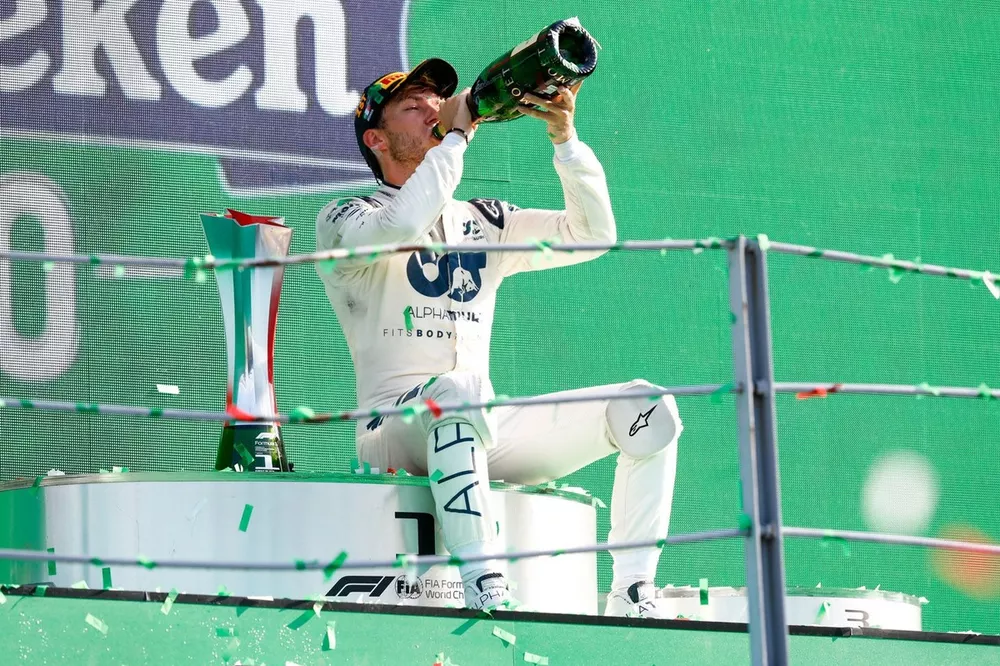 Pierre Gasly, AlphaTauri, 1st position, drinks Champagne on the podium