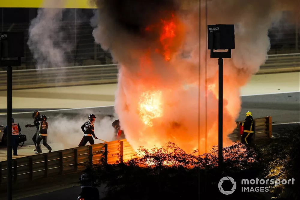 The crashed car of Romain Grosjean, Haas VF-20 on fire
