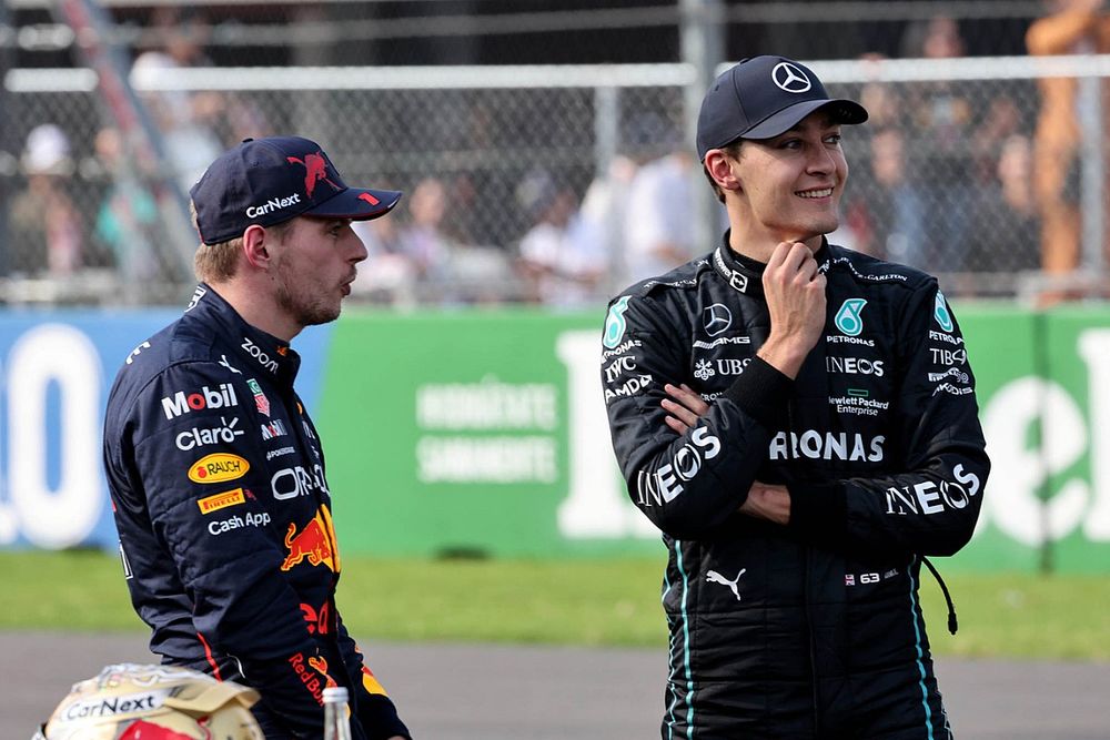 George Russell, Mercedes AMG, talks to pole man Max Verstappen, Red Bull Racing, after Qualifying