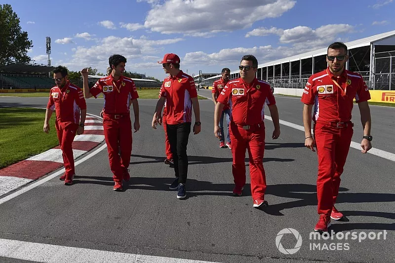 Charles Leclerc, Ferrari, walks the track 