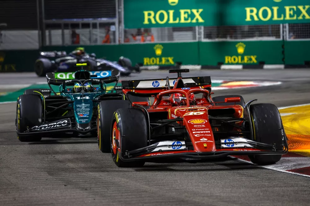 Charles Leclerc, Ferrari SF-24,  leads Fernando Alonso, Aston Martin AMR24