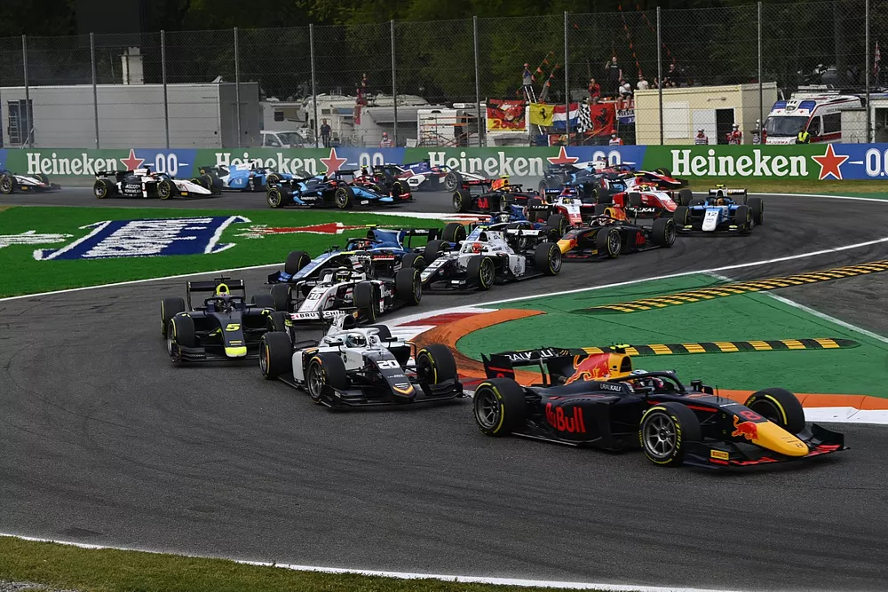 Juri Vips, Hitech Grand Prix, leads Matteo Nannini, Campos Racing, and Dan Ticktum, Carlin, at the start
