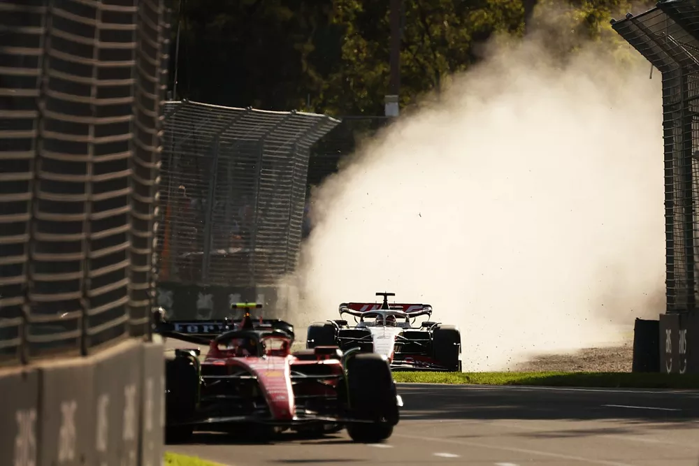 Kevin Magnussen, Haas VF-23 leaves the track as he follows Carlos Sainz, Ferrari SF-23