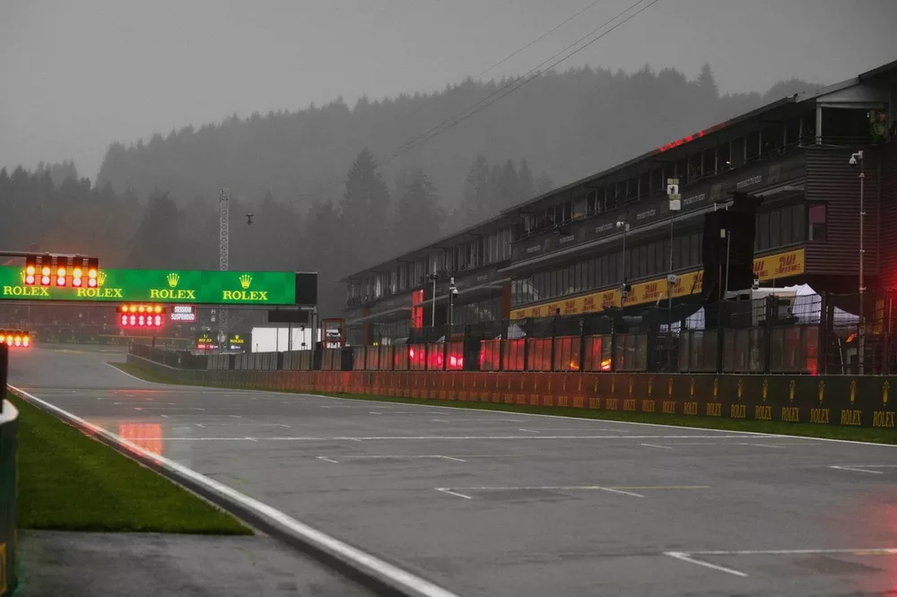 Red flag lights around the soaked circuit
