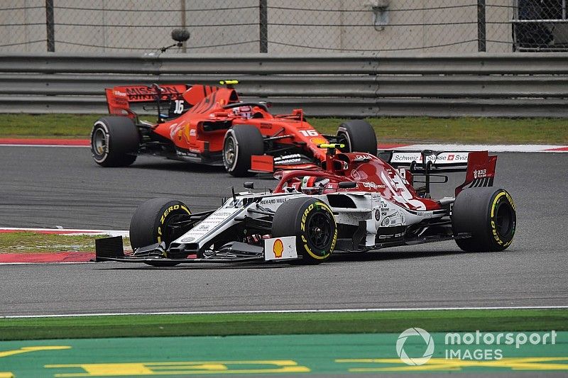 Antonio Giovinazzi, Alfa Romeo Racing C38, leads Charles Leclerc, Ferrari SF90