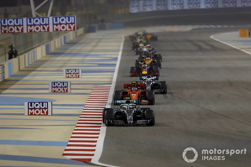 Valtteri Bottas, Mercedes AMG W10, leads Charles Leclerc, Ferrari SF90, and Lewis Hamilton, Mercedes AMG F1 W10