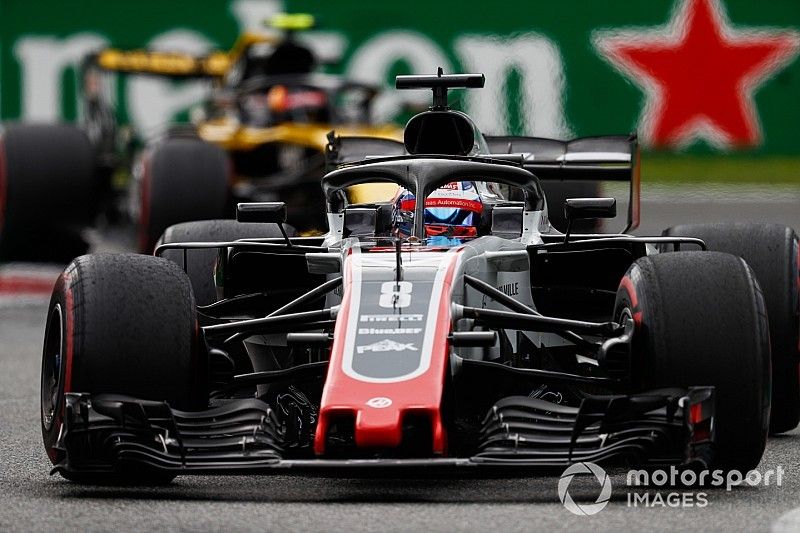 Romain Grosjean, Haas F1 Team VF-18,  Carlos Sainz Jr., Renault Sport F1 Team R.S. 18