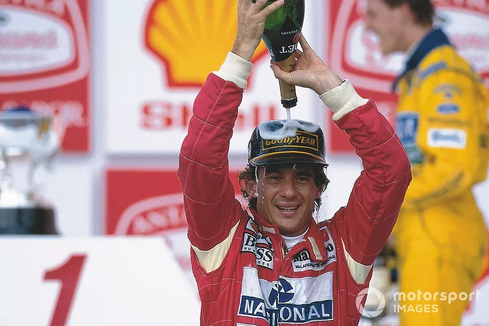 Ayrton Senna, McLaren Ford celebrates 1st position on the podium
