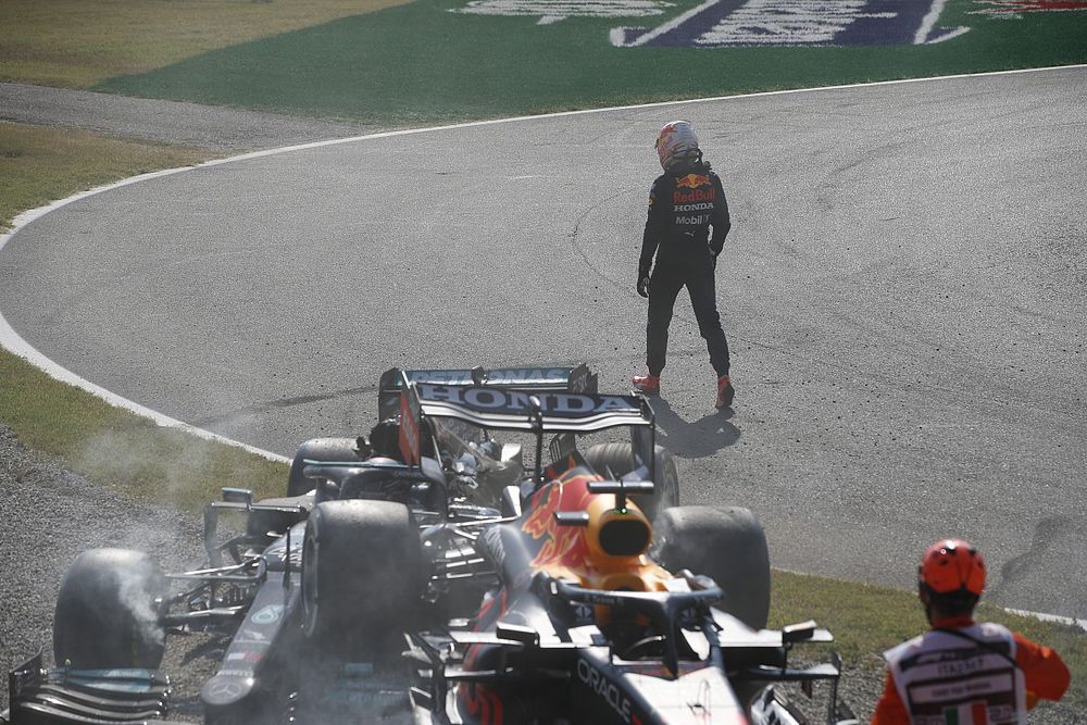 Max Verstappen, Red Bull Racing, walks away after crasing out with Lewis Hamilton, Mercedes W12