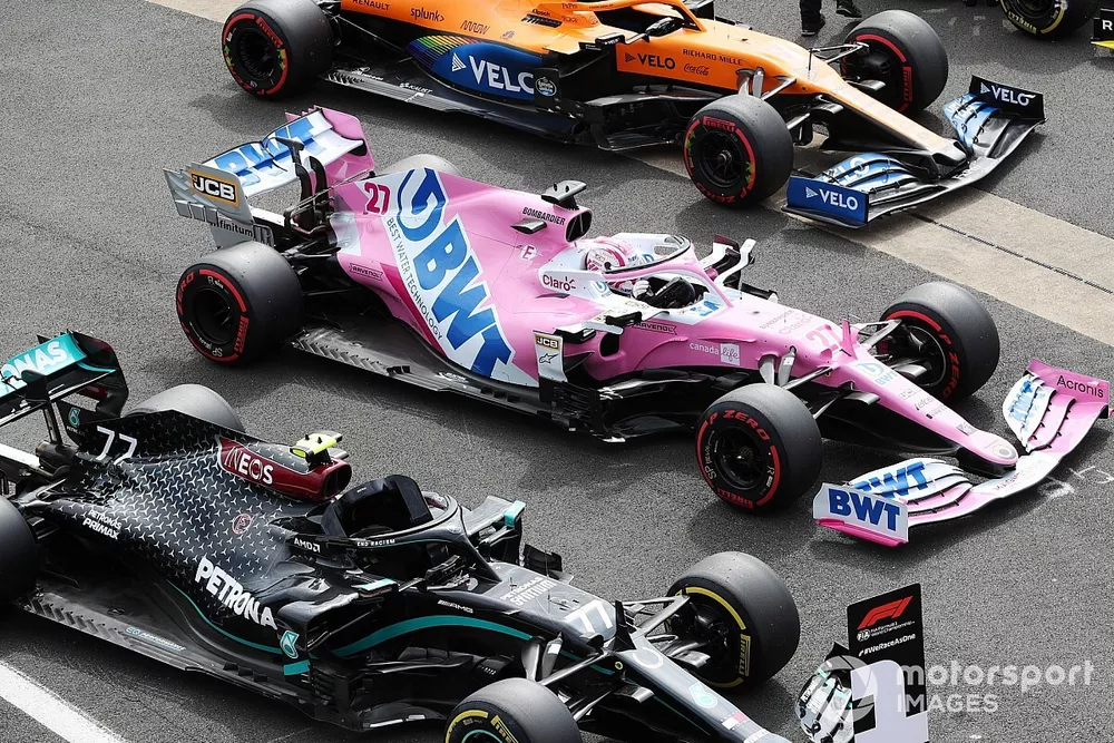 The cars of Pole sitter Valtteri Bottas, Mercedes F1 W11, Nico Hulkenberg, Racing Point RP20, Lando Norris, McLaren MCL35, and Daniel Ricciardo, Renault F1 Team R.S.20, in Parc Ferme after Qualifying