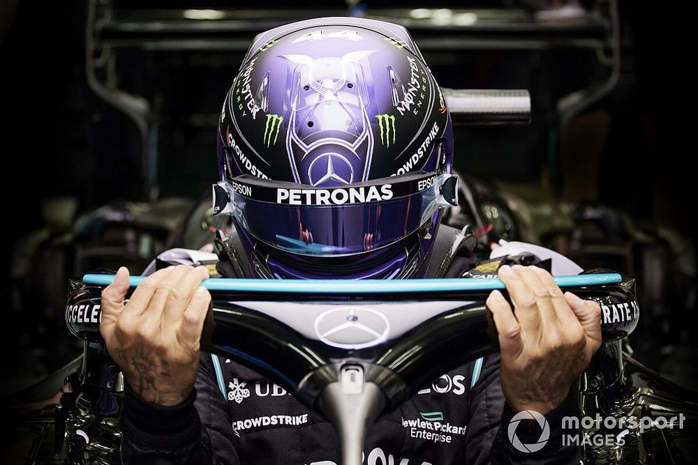 Lewis Hamilton, Mercedes, enters his cockpit