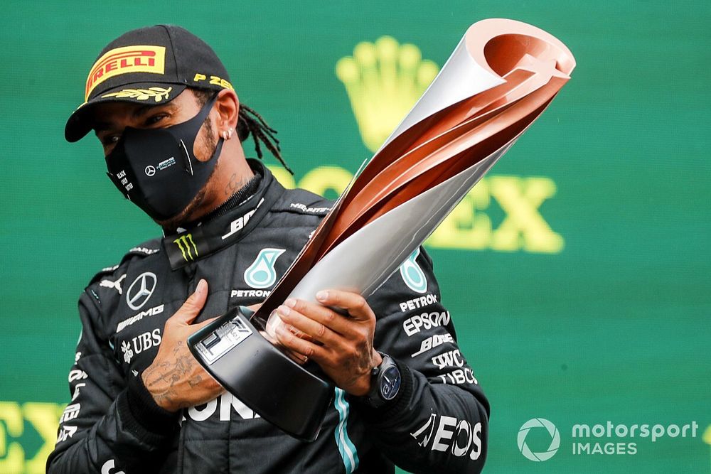 Seven times world drivers champion Lewis Hamilton, Mercedes-AMG F1, 1st position, lifts his trophy on the podium