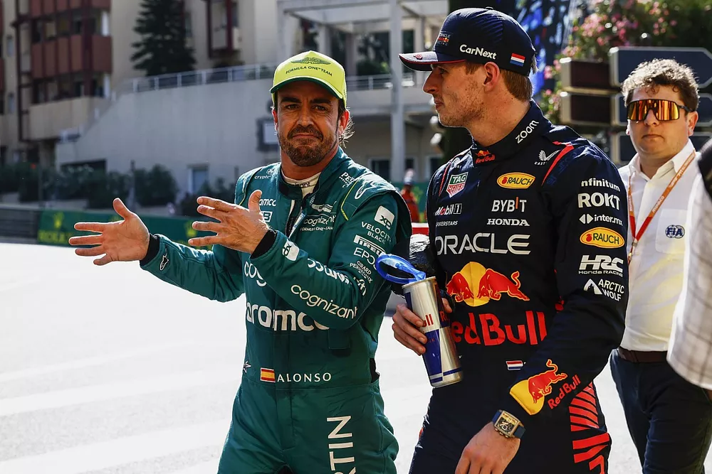 Fernando Alonso, Aston Martin F1 Team, pole man Max Verstappen, Red Bull Racing, talk in Parc Ferme