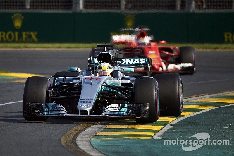 Lewis Hamilton, Mercedes AMG F1 W08, leads Sebastian Vettel, Ferrari SF70H