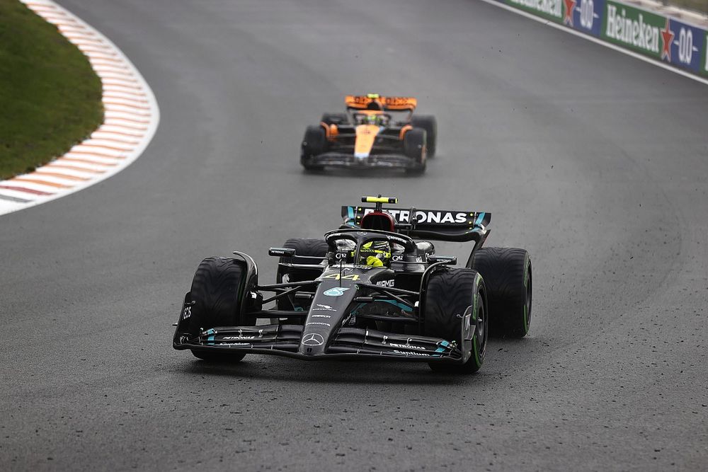 Sir Lewis Hamilton, Mercedes F1 W14, leads Lando Norris, McLaren MCL60