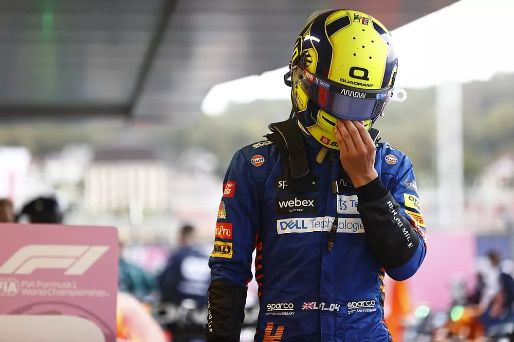 Lando Norris, McLaren, comiserates with himself after the race