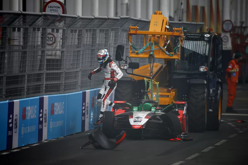 Rene Rast, Audi Sport ABT Schaeffler, climbs from his car after a crash