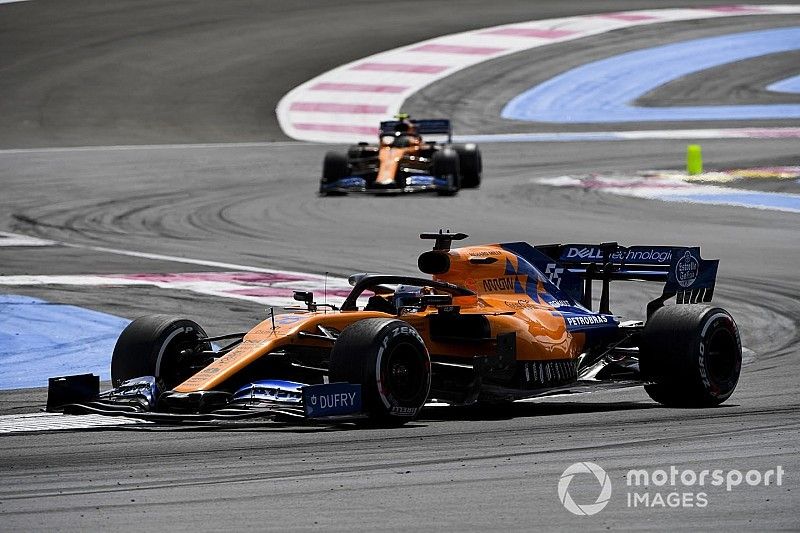 Carlos Sainz Jr., McLaren MCL34, leads Lando Norris, McLaren MCL34