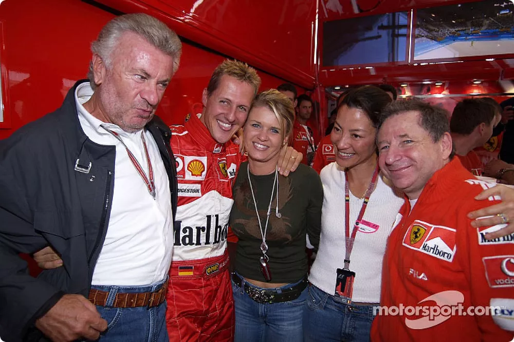 Michael Schumacher celebra 7 &ordm; Campeonato del mundo con Willi Webber, esposa Corinna y Jean Todt