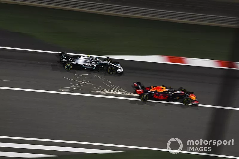 Max Verstappen, Red Bull Racing RB15, battles with Valtteri Bottas, Mercedes AMG W10