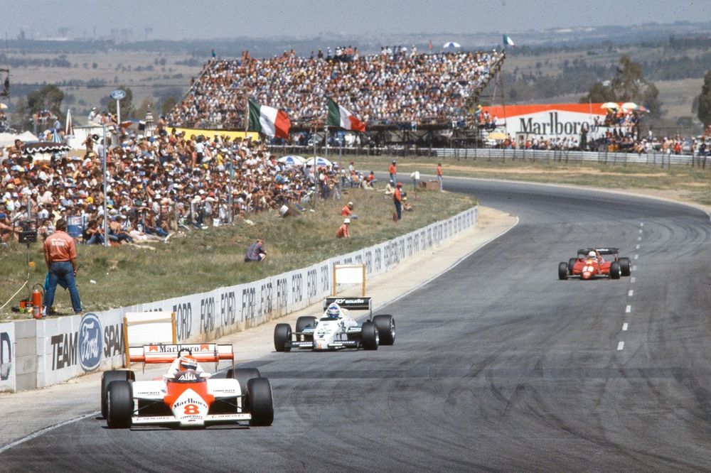 Niki Lauda, McLaren MP4-1E TAG, leads Keke Rosberg, Williams FW09 Honda, and René Arnoux, Ferrari 126C3