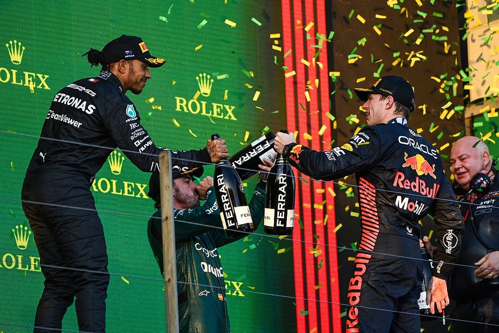 Lewis Hamilton, Mercedes-AMG, 2nd position, Max Verstappen, Red Bull Racing, 1st position, celebrate with Champagne