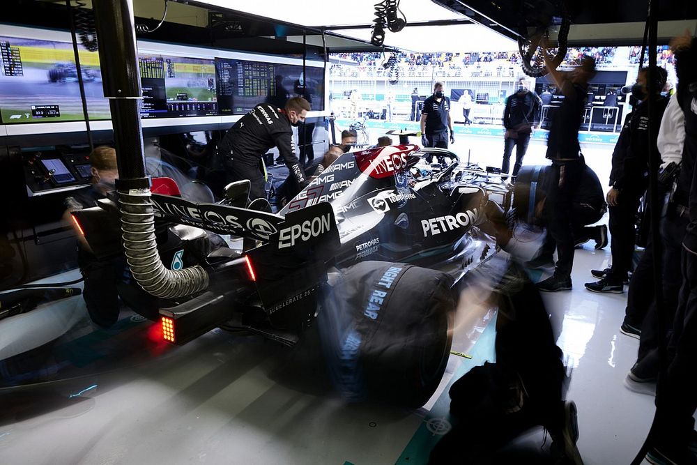 Valtteri Bottas, Mercedes W12, leaves the garage