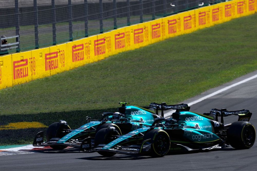 Sebastian Vettel, Aston Martin AMR22, battles with Lance Stroll, Aston Martin AMR22